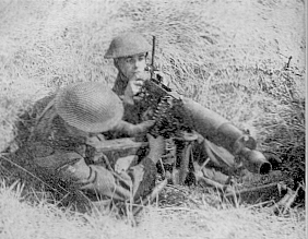 A Vickers MG team in training: Firing from behind cover